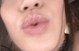 33 kissing GIFs! - A naughty girl who chews at the camera is erotic and comes out! 18th image