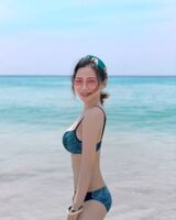 Hong Kong girl Rina can't cover the beautiful double ball body in a white swimsuit that makes people spitt nosebleeds